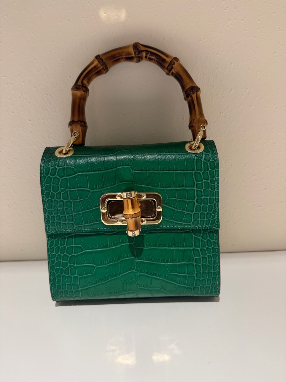 Elegant Green Croc-Embossed Top Handle Bag with Bamboo Accent